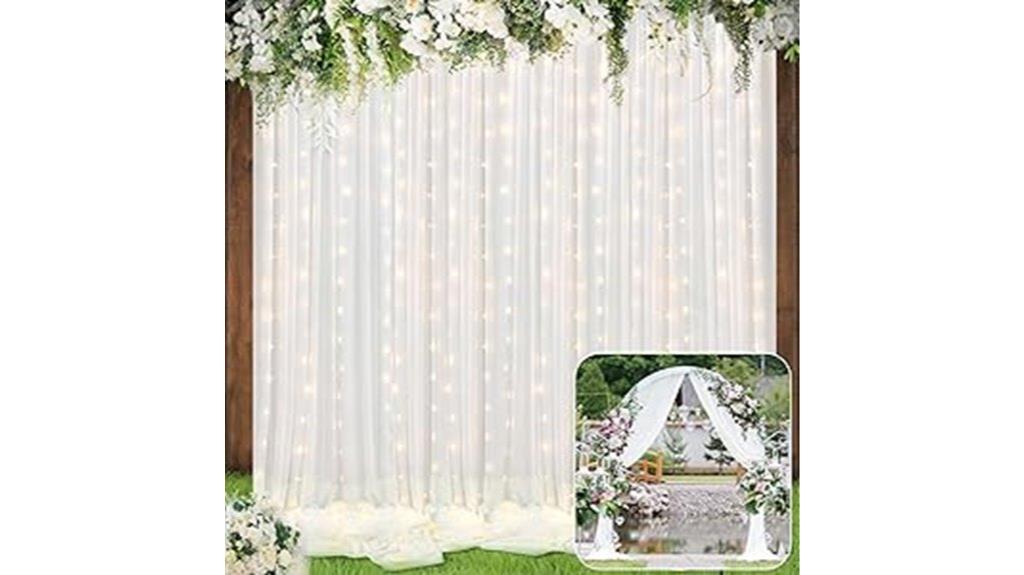 white tulle backdrop with lights